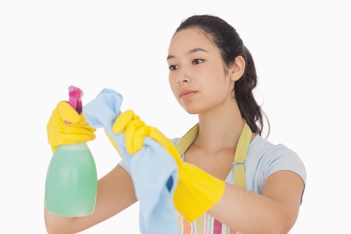 Local office cleaner working in a commercial building in N8